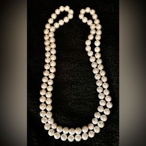 48”inch vintage, double strand costume pearl necklace.  Mint condition!